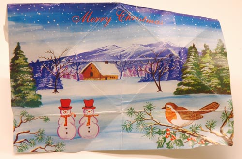 paper boat made from xmas card